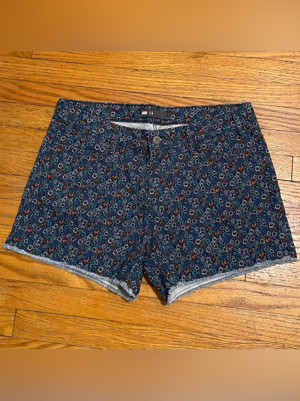Levi’s Floral Denim Raw Hem Shorts